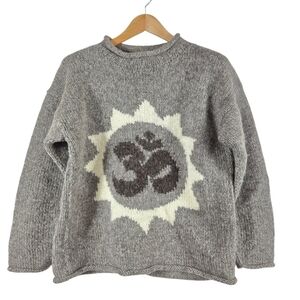 Made in Nepal thick knitted wool with OM and sun symbol